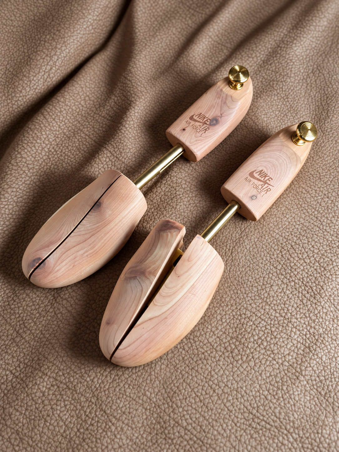 Nike Air Force 1 cedar shoe trees showing the expanded split-toe construction
